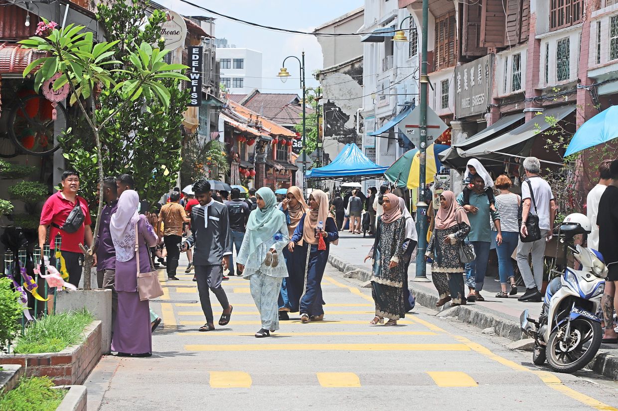 gridlock in penang as visitors take in the sights amid festive joy