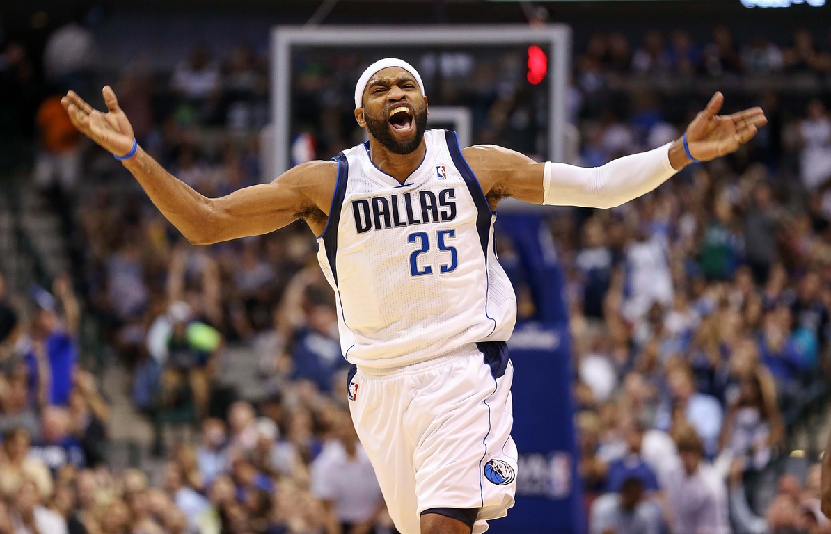 Dallas Mavericks shooting guard Vince Carter (25) celebrates after scoring a basket against the Charlotte Bobcats during the second half at the American Airlines Center in Dallas, Tx on November 3, 2012.