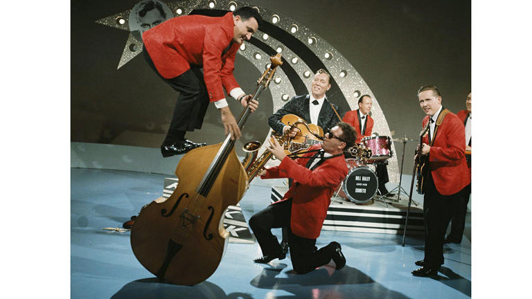 Bill Haley and His Comets, featuring Al Rappa standing on his double bass, perform on "Thank Your Lucky Stars" TV show at Aston Studios in September 1964 in Birmingham, United Kingdom. Image is part of David Redfern Premium Collection. Getty Images
