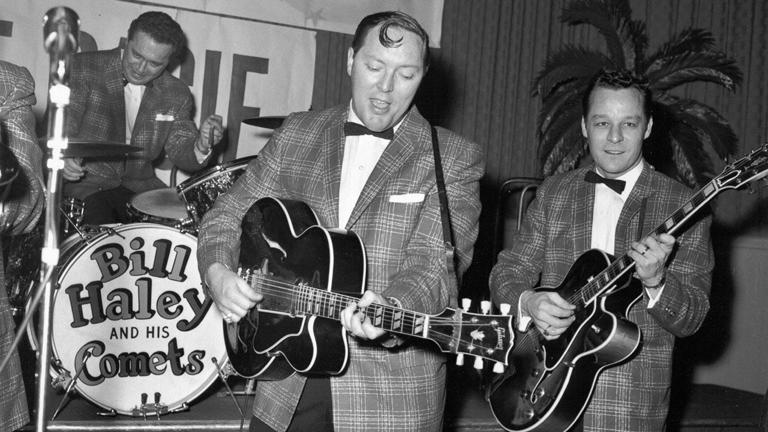 Bill Haley and his Comets perform onstage in 1955 in New York. They recorded "(We're Gonna) Rock Around the Clock" in New York City in 1954. Getty Images