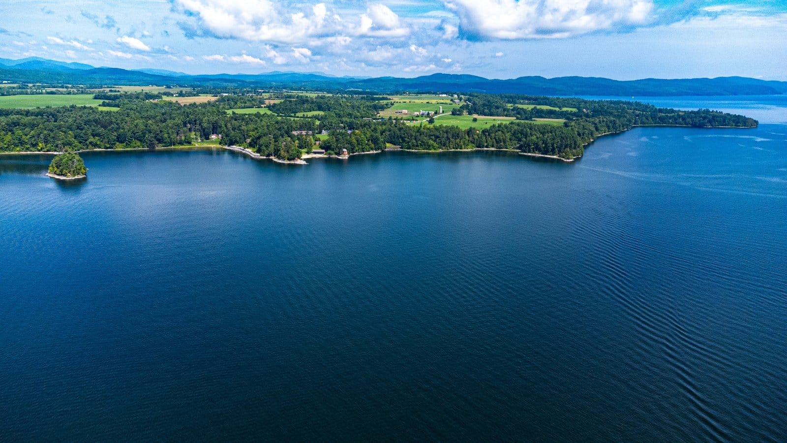 <p class="wp-caption-text">Image Credit: Shutterstock / Alexander Ryan Thompson</p>  <p><span><strong>Depth:</strong> 400 feet</span> <span>Rich in history and legend, Lake Champlain offers myriad recreational activities, from exploring historic sites and lighthouses to enjoying its diverse aquatic life.</span></p>