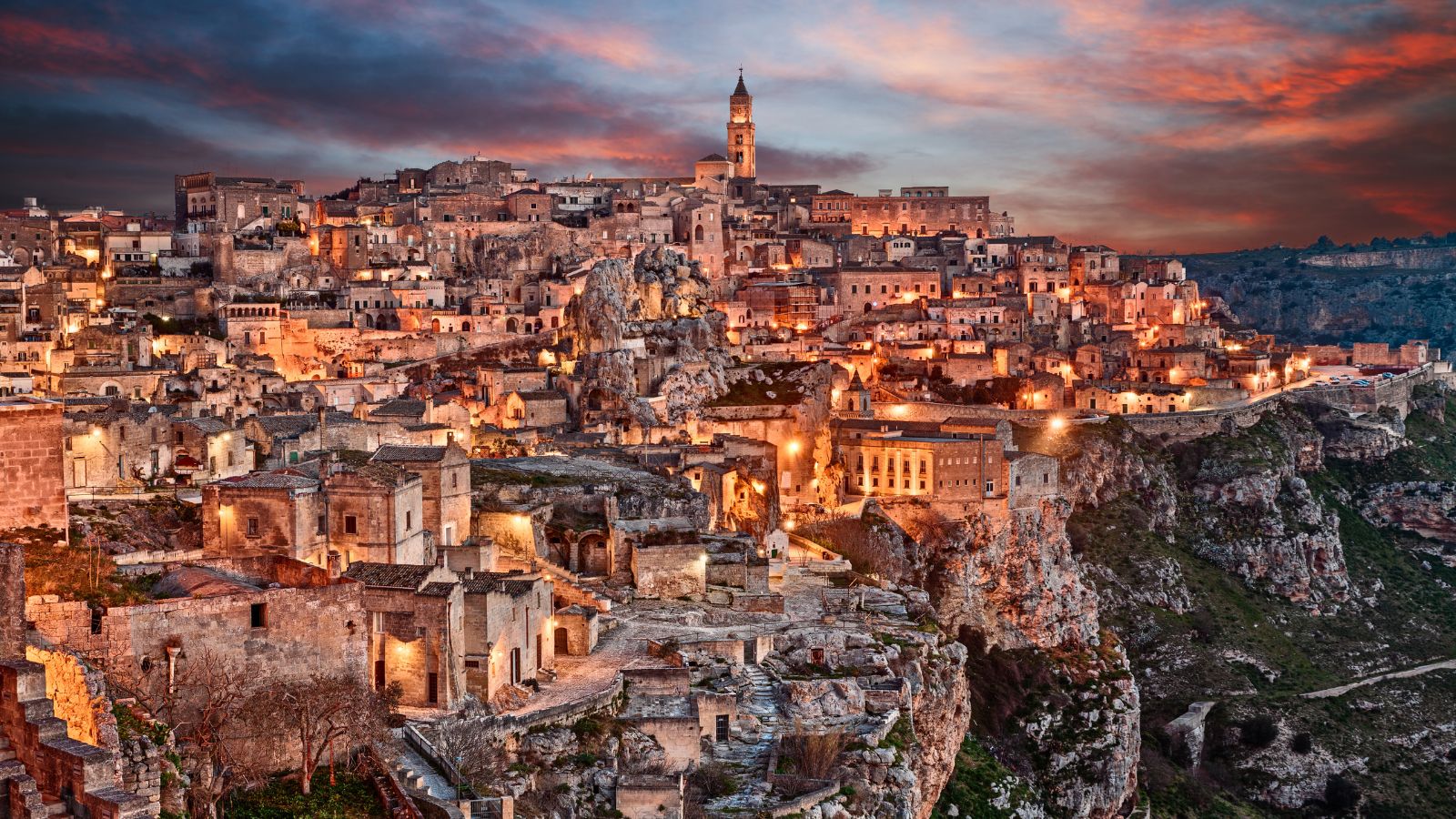 <p>The ancient caves in Sassi di Matera became a UNESCO World Heritage Site in <a href="https://www.italia.it/en/basilicata/matera/things-to-do/matera-the-sassi">1993</a> and are well worth a visit if you head to Matera. You’ll also be able to learn about the city’s history and culture at the Casa Grotta, or Cave House, museum. Matera is full of unique landscapes and architecture with breathtaking viewpoints.</p>