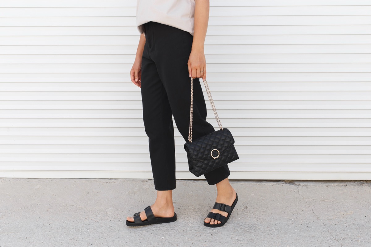 <p>You also have to think about shoes that will work with different outfits, even if you're drawn to those bolder summer colors and styles.</p><p>"Black sandals are a capsule wardrobe must-have due to their adaptability in the summer," Rizzo says. "These <a rel="nofollow noopener noreferrer external" href="https://www.everlane.com/products/womens-day-crossover-new-sandal-black">slip-on crossover sandals</a> look great with any outfit for any occasion and are the perfect option for when you can't decide which shoes to wear."</p>