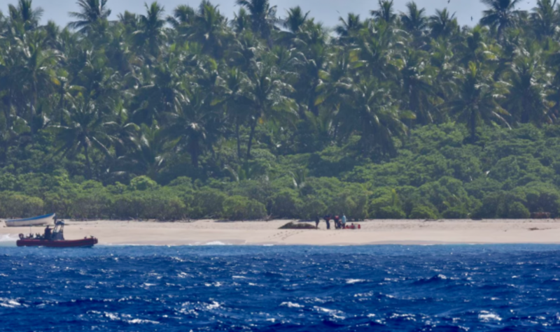 Three men rescued from tiny island in Pacific Ocean after writing 'HELP ...