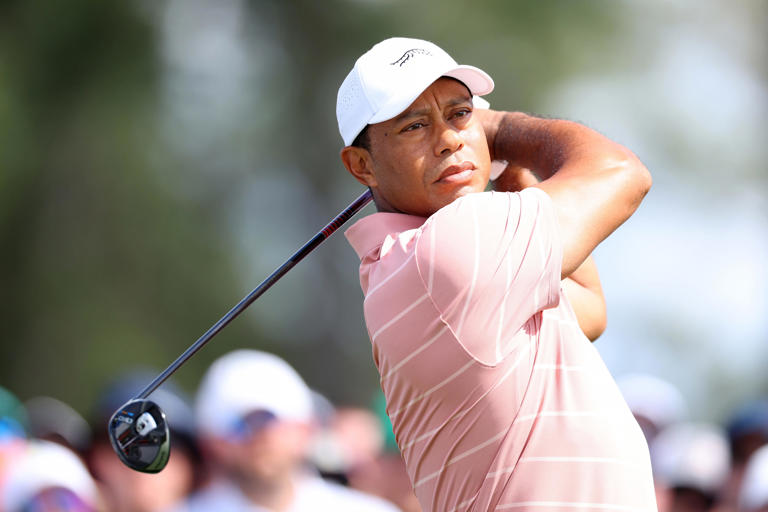 AUGUSTA, GEORGIA - APRIL 11: Tiger Woods of the United States plays his shot from the first tee during the first round of the 2024 Masters Tournament at Augusta National Golf Club on April 11, 2024 in Augusta, Georgia. (Photo by Andrew Redington/Getty Images)