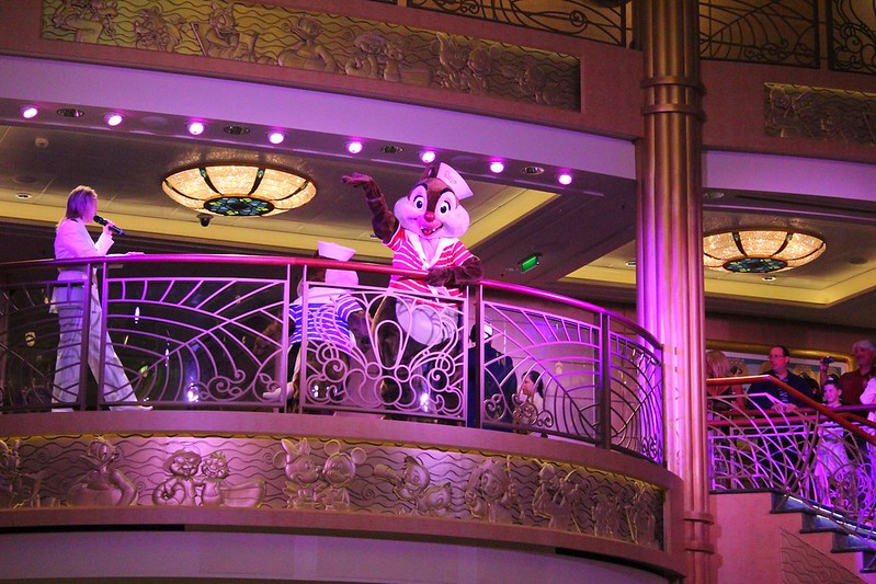 <p>Don't miss your chance to <strong>take </strong><strong>photos with Disney characters</strong> on the last night of your cruise. </p>  <p>Around 10 or 10:30 p.m., characters gather in the atrium for a short period, allowing guests to bid farewell and snap memorable pictures. </p>