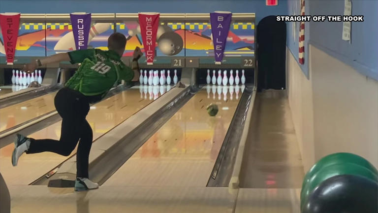 Mikey Schlabach releases a ball down a lane for a clean strike, provided by Straight Off The Hook.
