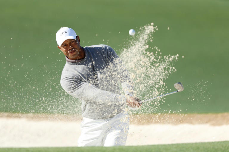 Tiger grinds to more Masters history as US stars fight for lead
