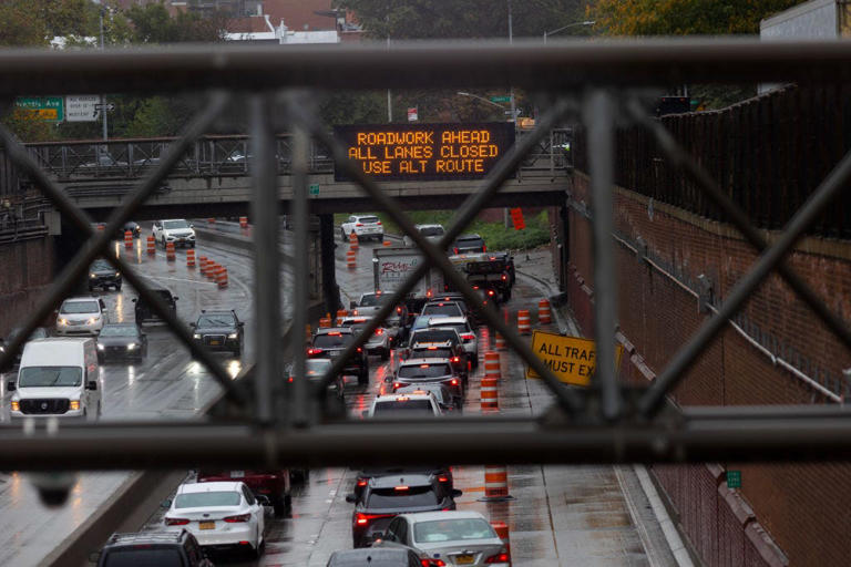 Road work on the Brooklyn-Queens Expressway, closing the roadway and creating a traffic jam on Oct. 14, 2023.