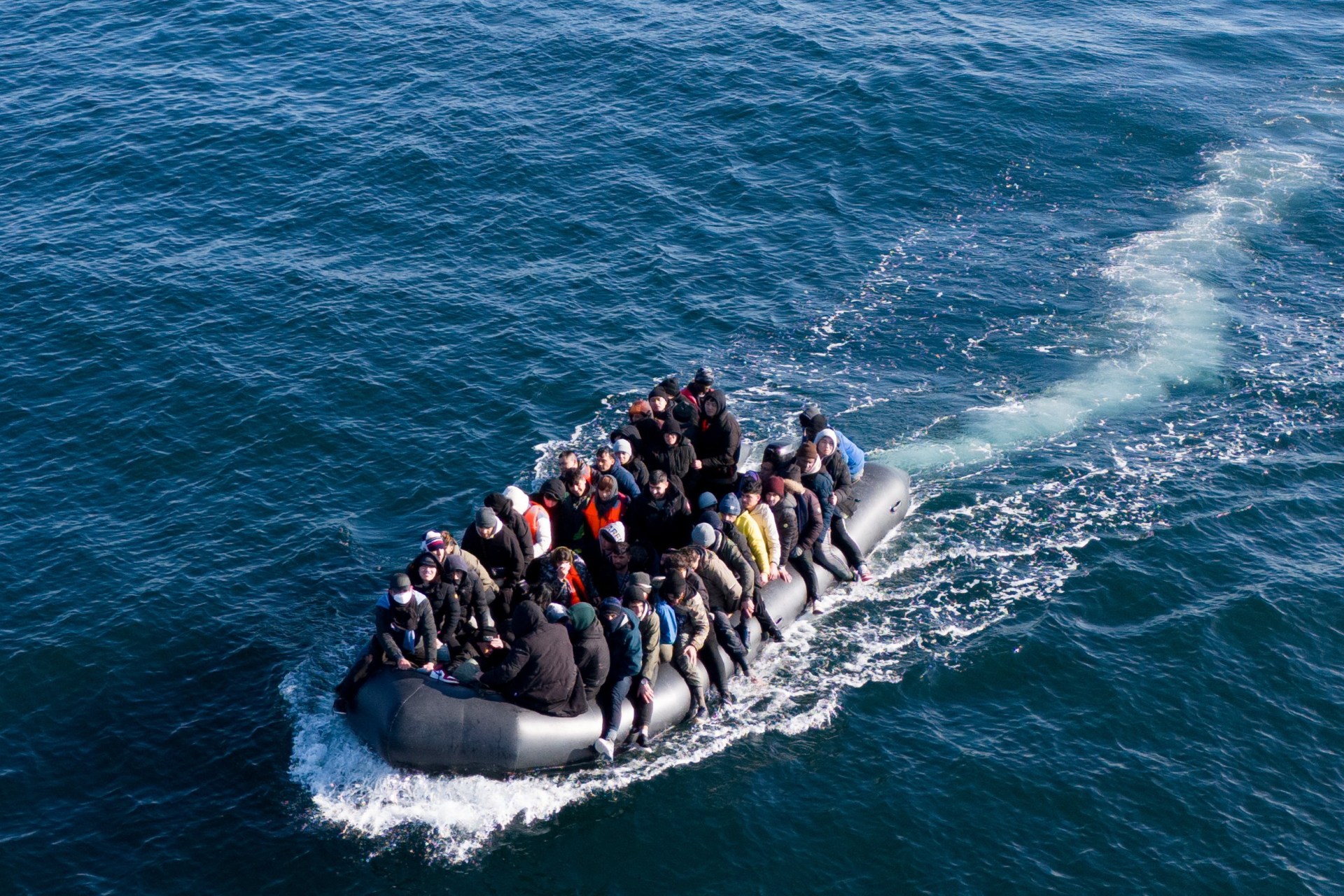 british rescuers save migrants in ‘grave danger’ as french look on