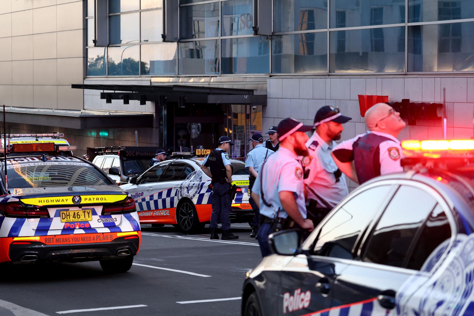 six killed as hundreds flee sydney shopping centre after stabbing attack