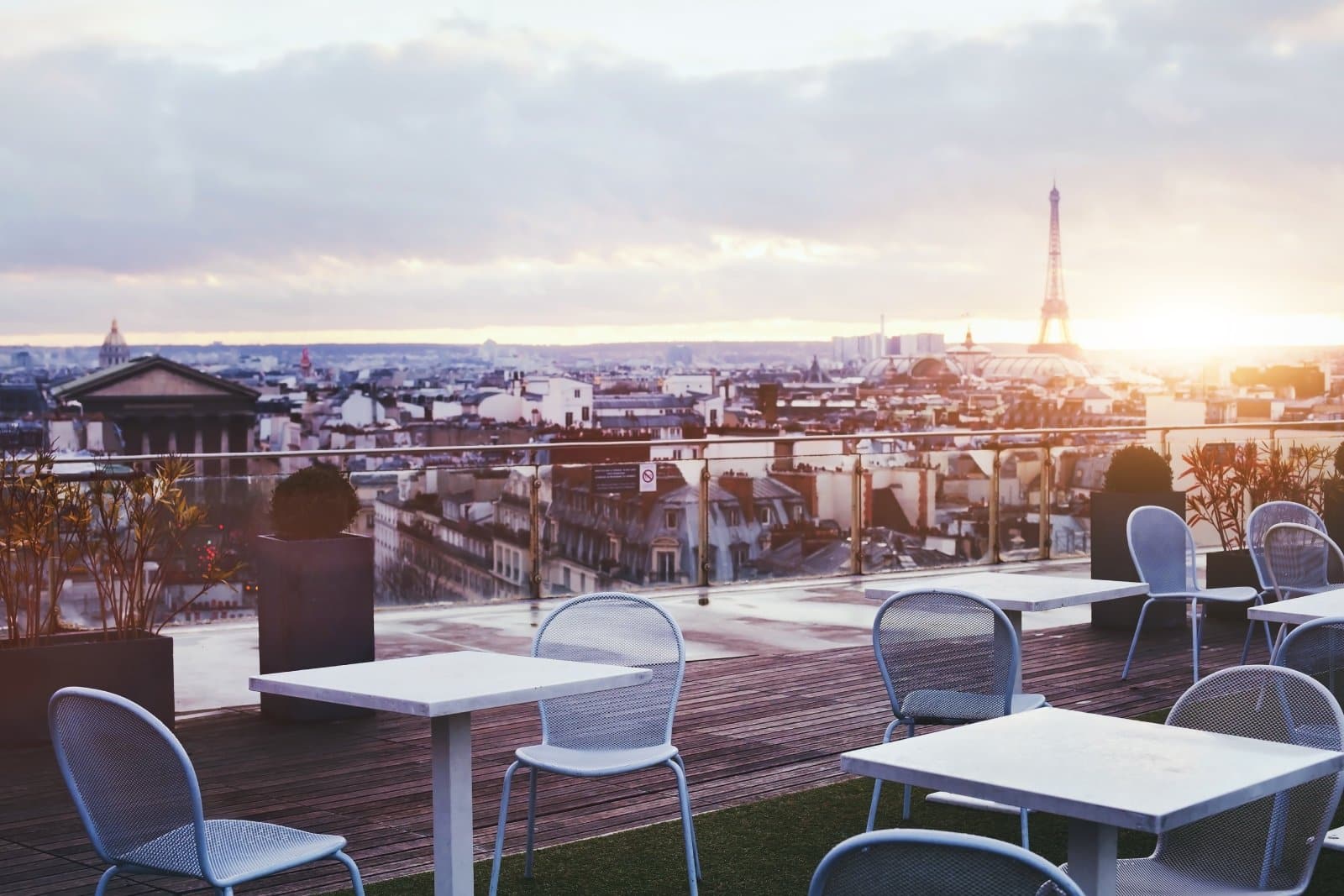 Image Credit: Shutterstock / Song_about_summer <p>A sea of zinc rooftops against the city’s skyline from the heights of Notre Dame or Montparnasse Tower captures the essence of Parisian charm.</p>