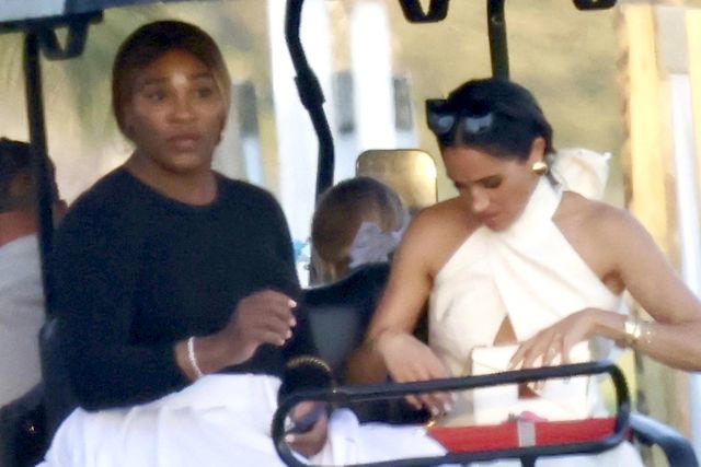 BACKGRID Meghan Markle and Serena Williams sit in a golf cart together in Florida on April 12