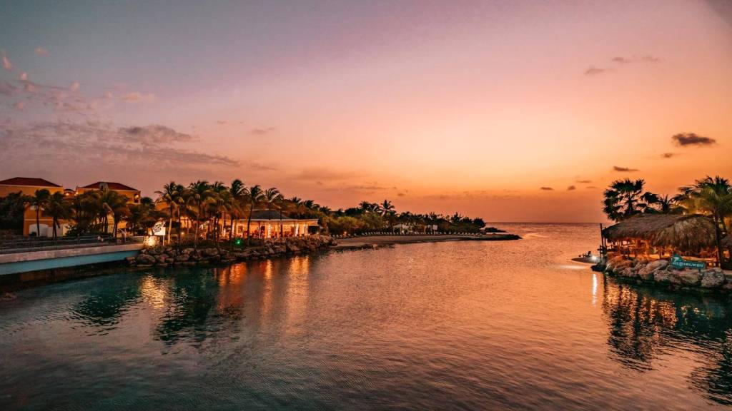 <p>Curaçao is the perfect destination for a romantic sunset getaway. Whether celebrating a special occasion or simply indulging in a moment of tranquility with your loved one, there are endless opportunities for romance on the island.</p><p>Playa Kalki, with its mushroom-shaped coral formations and crystalline waters, offers a secluded haven for sunset seekers.</p><p>On the other hand, Kenepa Grande, renowned for its postcard-perfect views, is another must-visit destination for sunset lovers. The beach is atop towering cliffs overlooking the azure Caribbean Sea and has lookout points offering unrivaled panoramas whose sunset views are guaranteed to take your breath away.</p><p class="has-text-align-center has-medium-font-size">Read also: <a href="https://worldwildschooling.com/exotic-beaches/">Incredible Exotic Beaches</a></p>