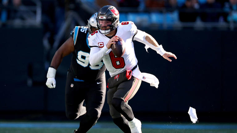 Baker Mayfield (6) of the Tampa Bay Buccaneers runs with the ball during the fourth quarter against the Carolina Panthers at Bank of America Stadium Jan. 7, 2024, in Charlotte, N.C. Getty Images