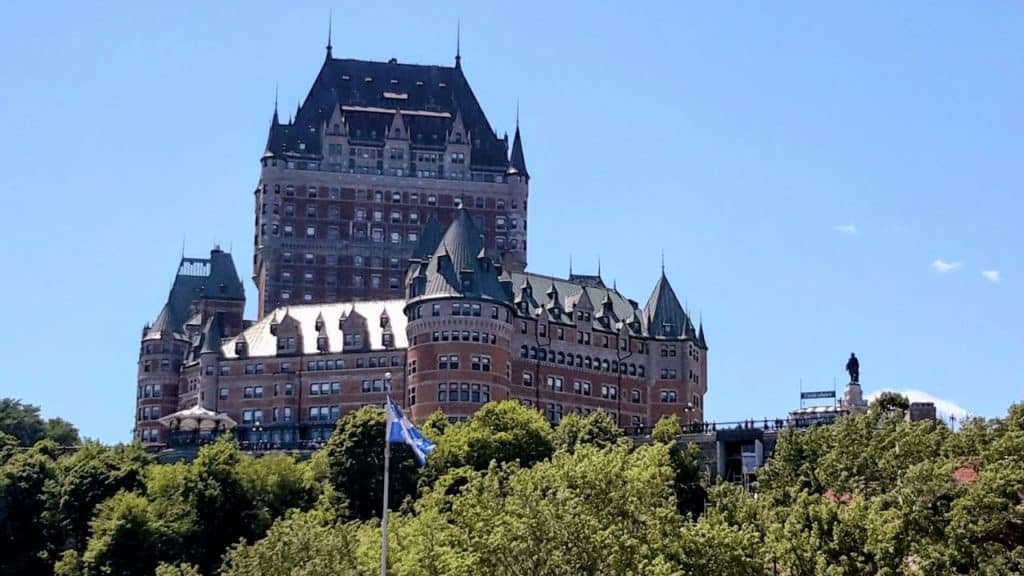 <p>Did you know that the Fairmont Chateau Frontenac is said to be the most photographed hotel in the world? The iconic Fairmont Château Frontenac in Quebec City, built between 1892 and 1893 by the Canadian Pacific Railway Company, sits proudly atop Cape Diamond and Dufferin Terrace. Inspired by France’s Loire Valley châteaux, it offers stunning panoramic views of the St. Lawrence River and the old port below. This historic landmark, nestled within Old Quebec’s UNESCO World Heritage Site and part of the fortification surrounding the old city, epitomizes elegance and luxury, drawing visitors worldwide with its timeless beauty.</p>