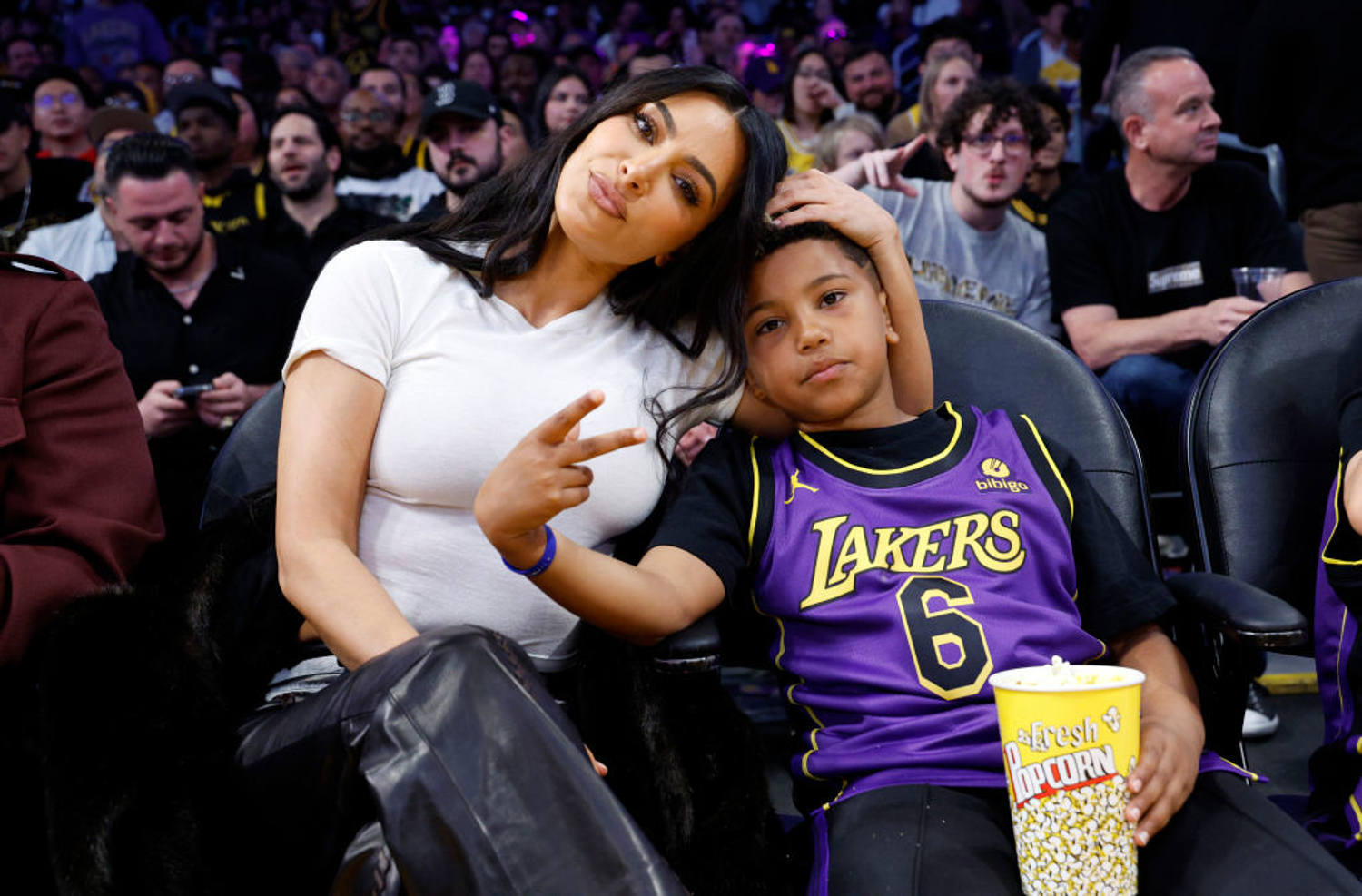 Kim Kardashian sits courtside at 8-year-old son Saint's basketball game