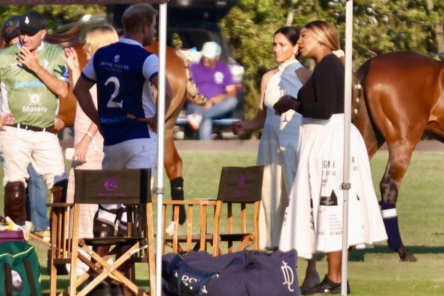 BACKGRID Meghan Markle and Serena Williams speak with Prince Harry at the Royal Salute Polo Challenge in Florida on April 12