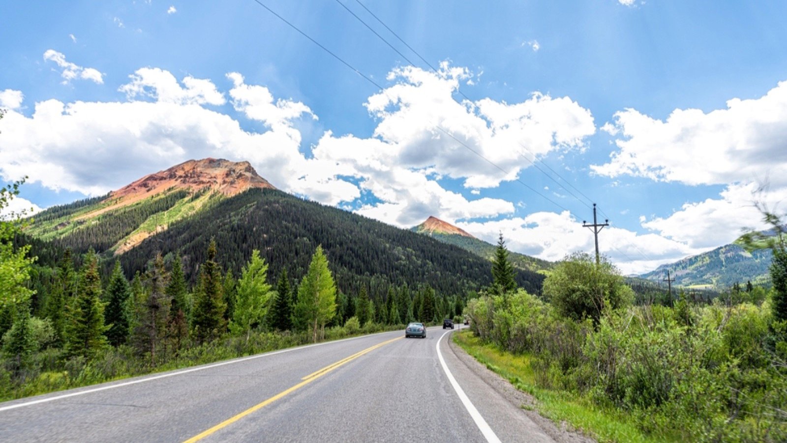 <p>While the Million Dollar Highway in Colorado is only 25 miles long, the frequent hairpin curves mean it takes over an hour to drive. Those who don’t have to concentrate on managing the turns can enjoy stunning views of the San Juan Mountains.</p><p>You can also visit alpine lakes and historic mining towns. The Telluride Historic District, San Juan Skyway Scenic Byway, Black Canyon of the Gunnison, Ouray Ice Park, and Box Canyon Falls are a few experiences along the way.</p>