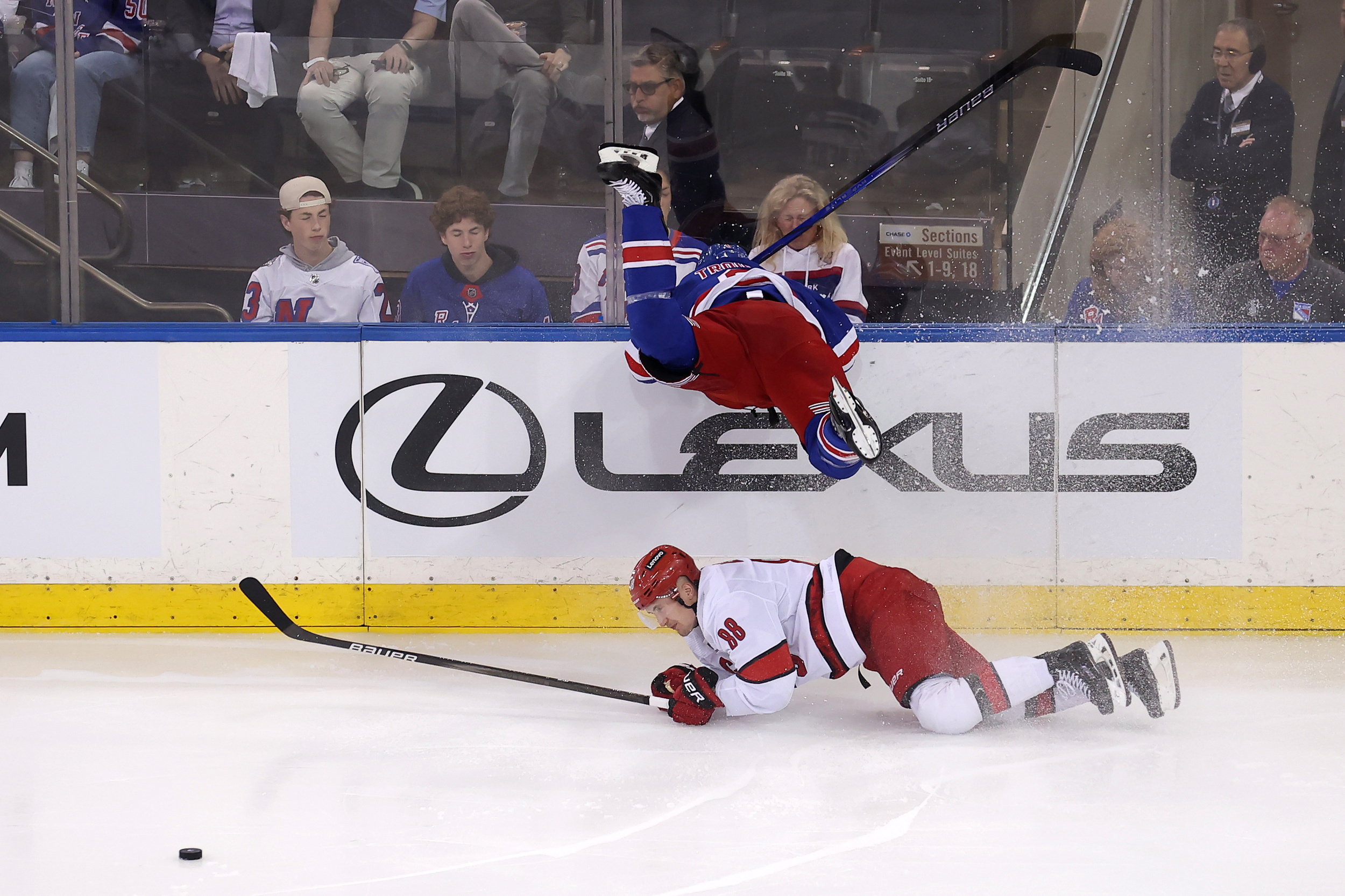 watch: rangers defenseman goes flying into boards during game 2