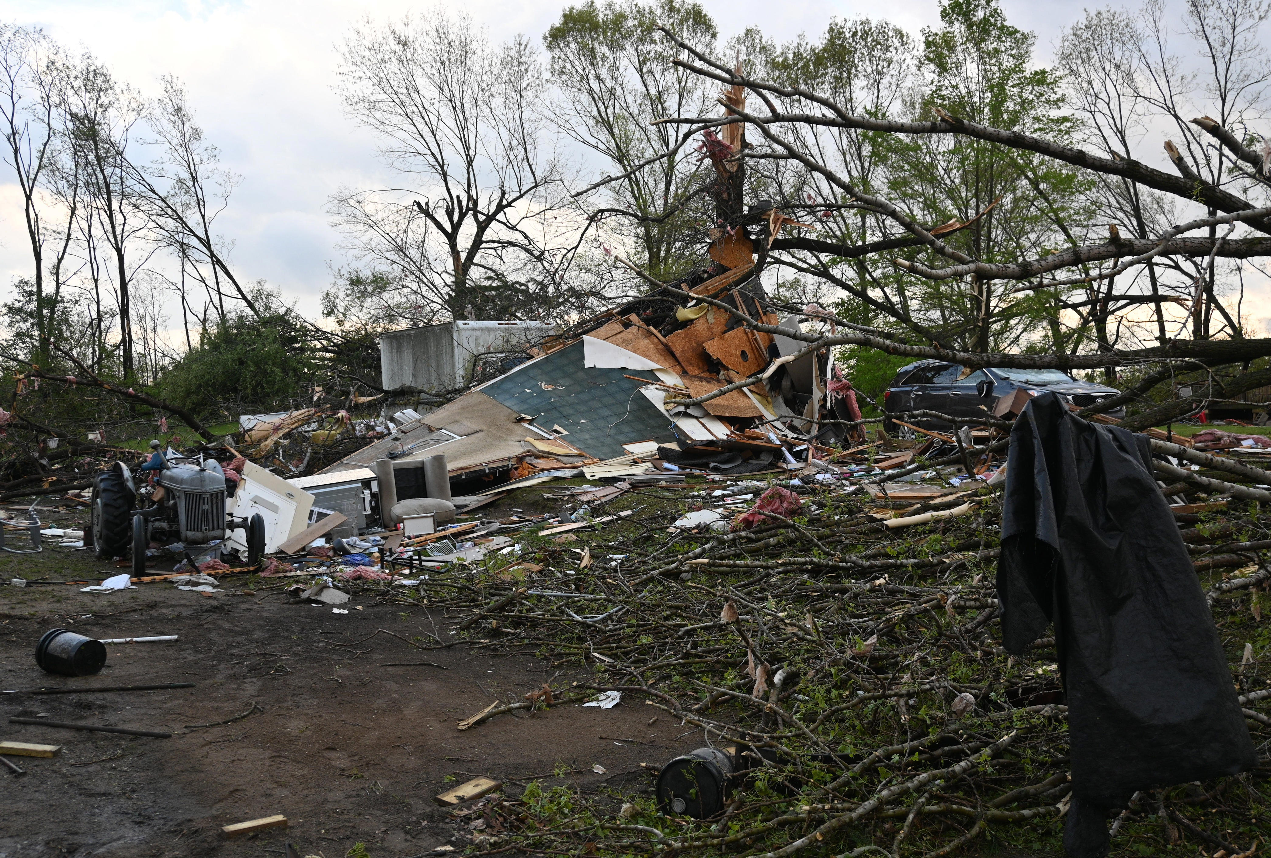 officials survey immense tornado damage in michigan as millions brace for severe weather