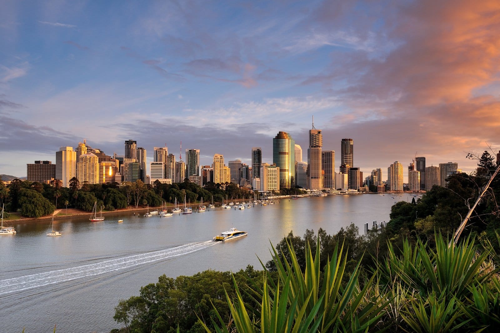 Image Credit: Shutterstock / Maythee Voran <p>Enjoy Brisbane’s subtropical climate, with days spent lounging on sandy beaches, exploring rainforests in nearby national parks, and dining alfresco at waterfront restaurants along the Brisbane River. Discover the city’s vibrant arts scene with visits to galleries, theaters, and music venues showcasing local talent and international acts.</p>