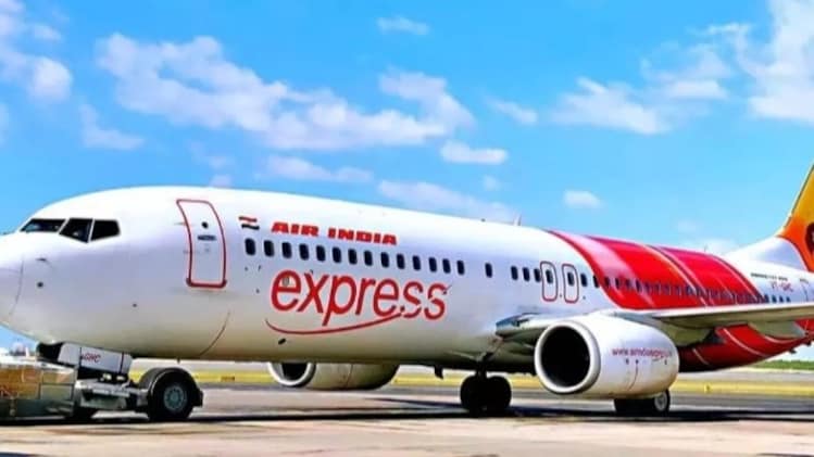 'i will lose my job': passengers in dismay after air india express cancels 86 flights as 300 cabin crew go on 'mass sick leave'