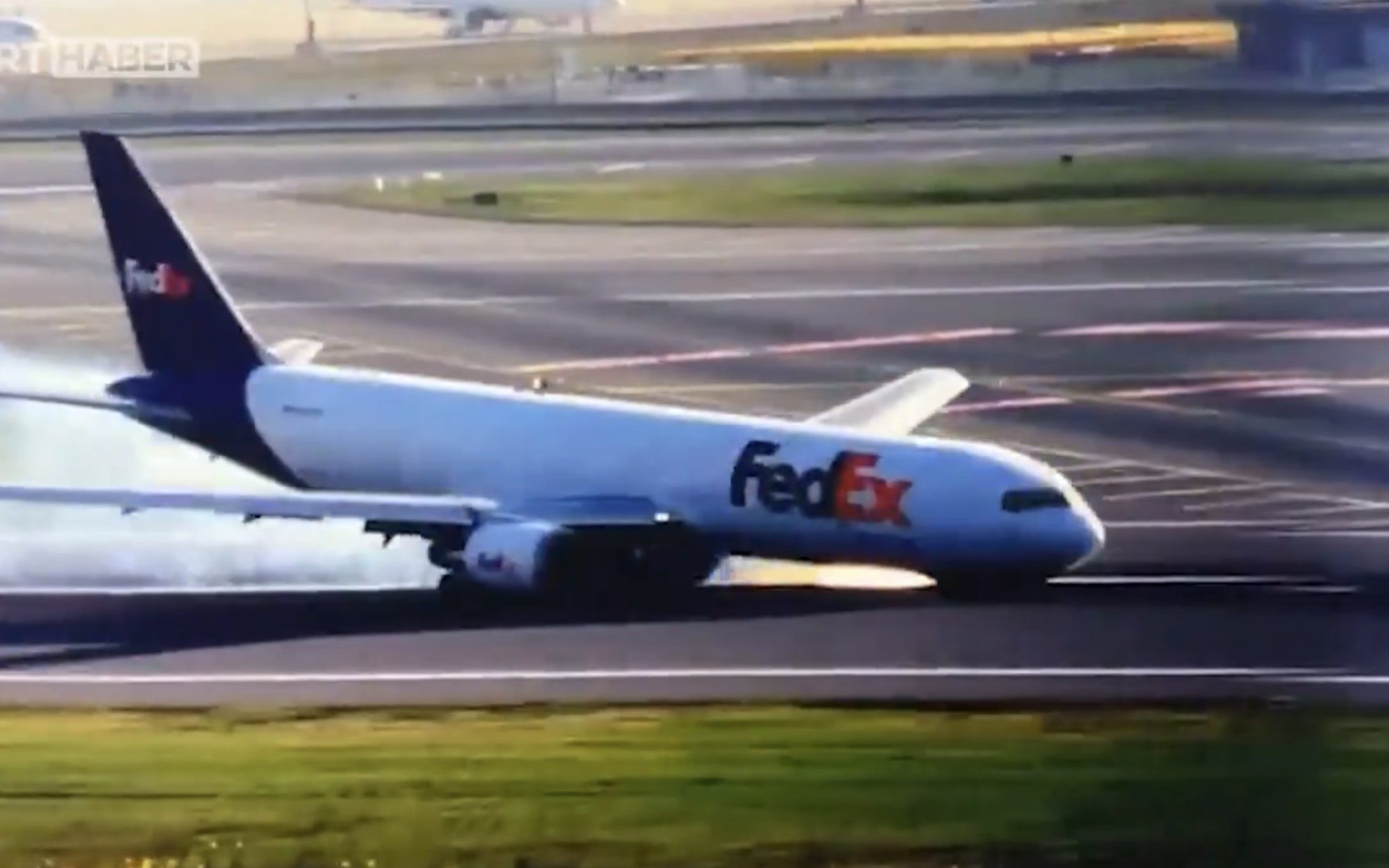 watch: boeing plane skids on runway as landing gear fails