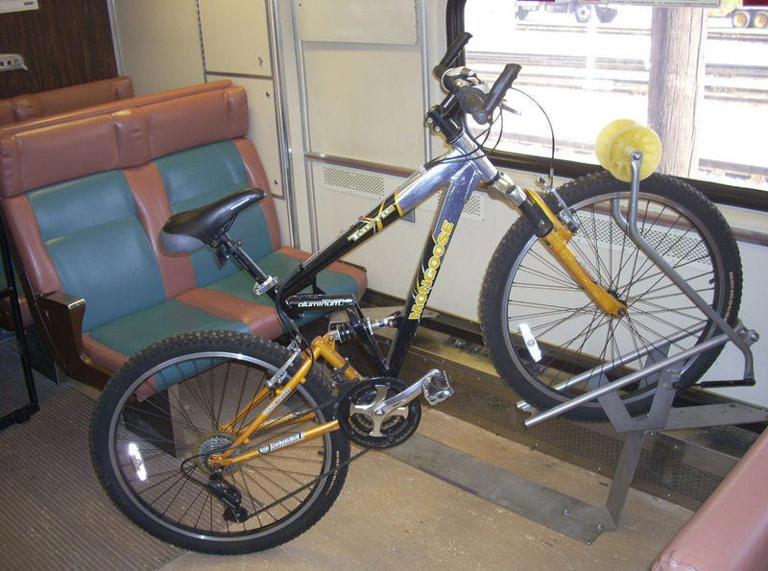 Bikes fit on to racks on South Shore Line trains, which will allow them all year starting in 2024.