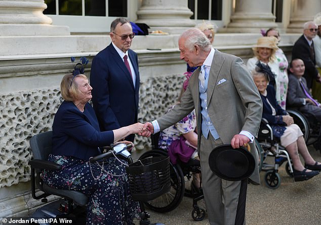 king charles 'delighted' at garden party despite harry visit