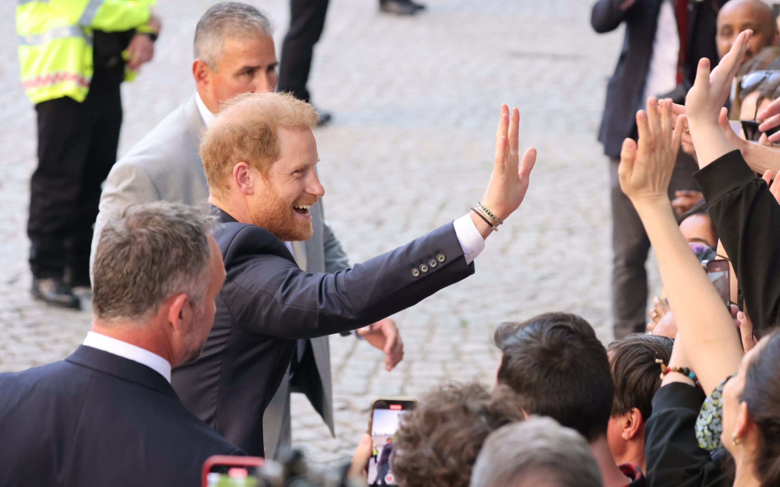 prince harry arrives at st paul’s cathedral as king hosts buckingham palace garden party