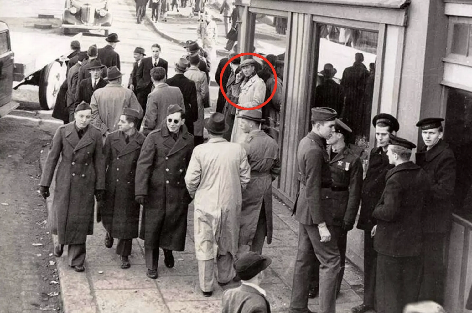 This photo comes from 1943 in Reykjavík, Iceland, and a man can be seen standing next to deployed US soldiers during World War II. The photo was posted in an Icelandic Facebook group, where people debated if he really is holding a cellphone.