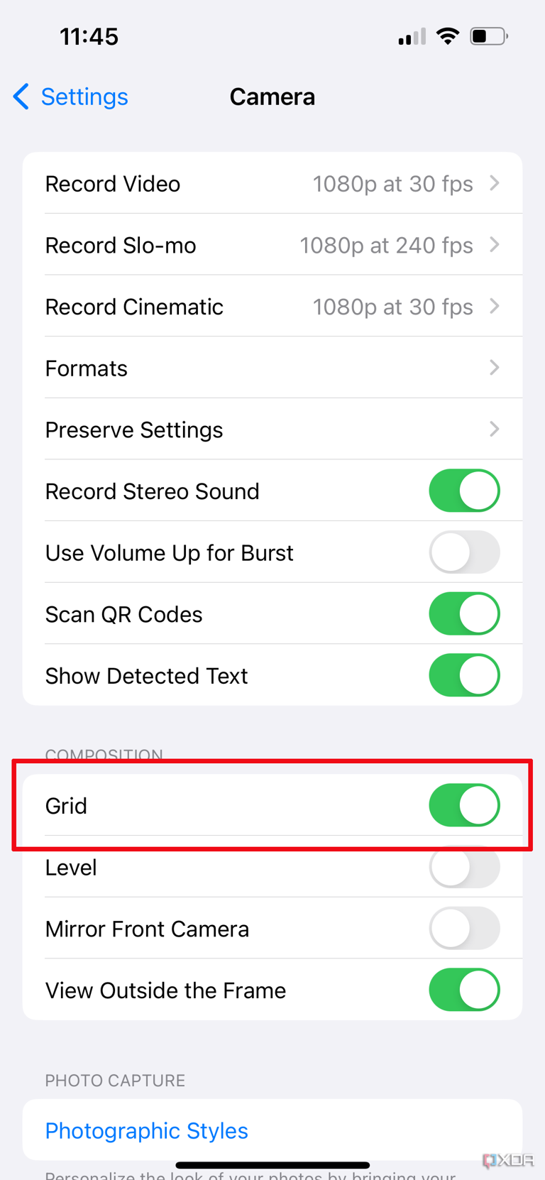 The iPhone Camera settings menu with Grid view selected.