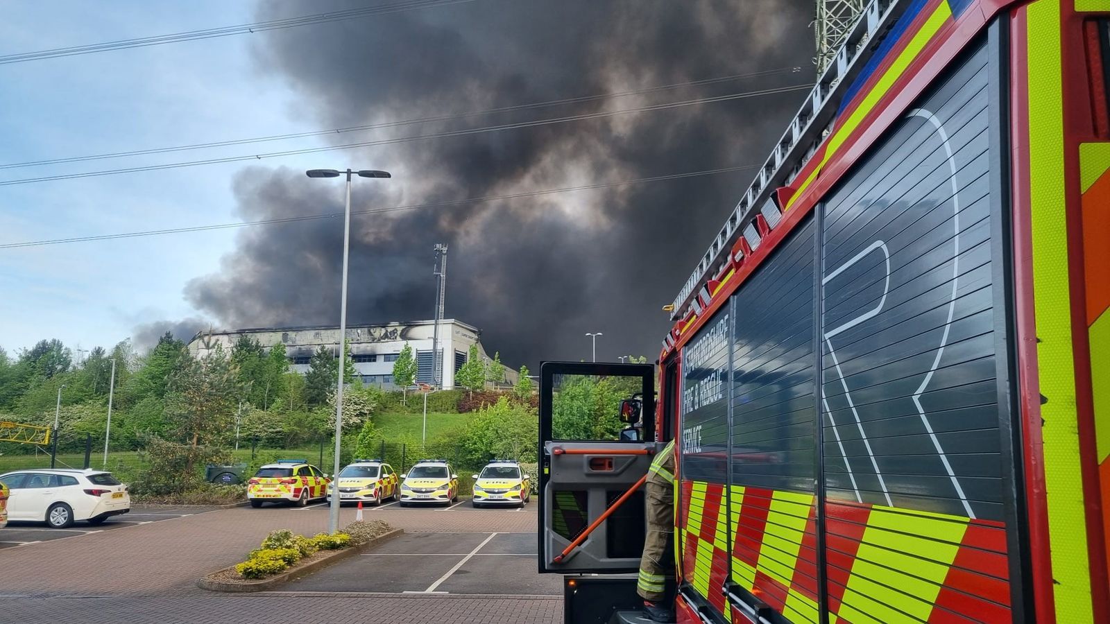 businesses forced to evacuate over parcel centre fire that 'could be seen 10 miles away'