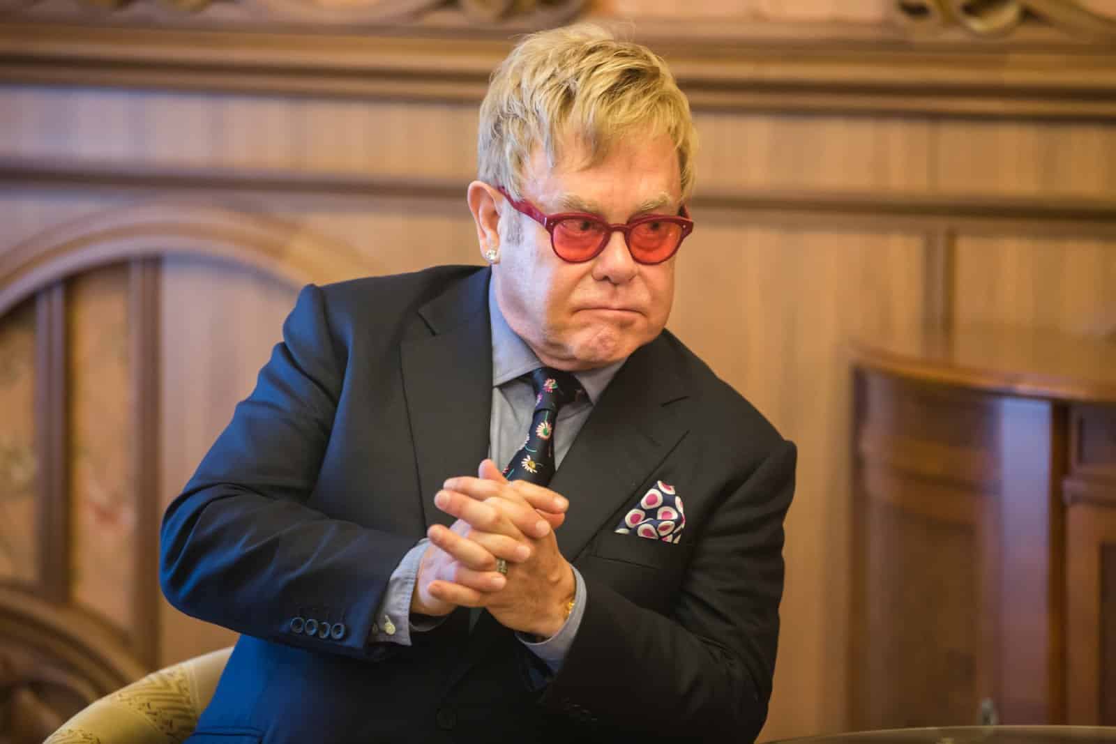 Image Credit: Shutterstock / Drop of Light <p><span>Elton John, upon receiving the Harvard Foundation’s Peter J. Gomes Humanitarian Award in 2017, spoke extensively about the challenges and advancements in the fight against HIV/AIDS, particularly in the LGBTQ+ community.</span></p>