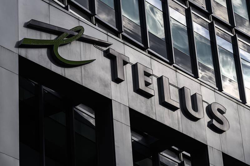telus reports q1 profit down from year ago, raises quarterly dividend