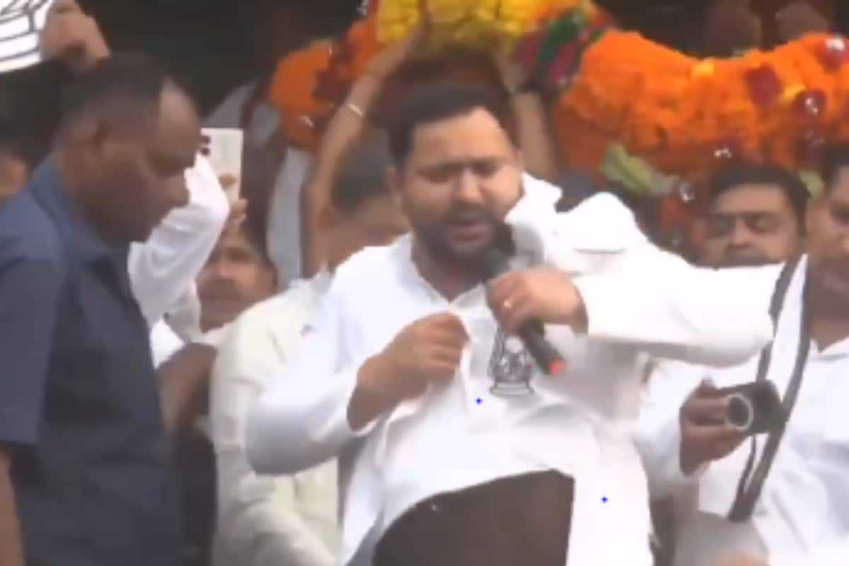 'i'm in unbearable pain': tejashwi yadav shows voters his waist belt during poll rally