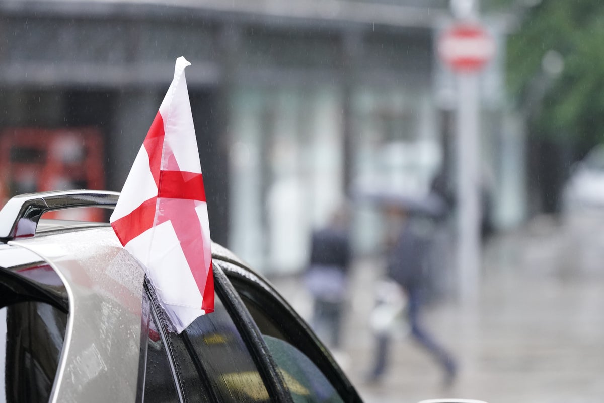flags attached to cars are not allowed to obstruct the driver’s vision