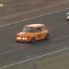 Vintage Racing Spectacle: Minis Clash with Mustangs in Epic Showdown<br>
