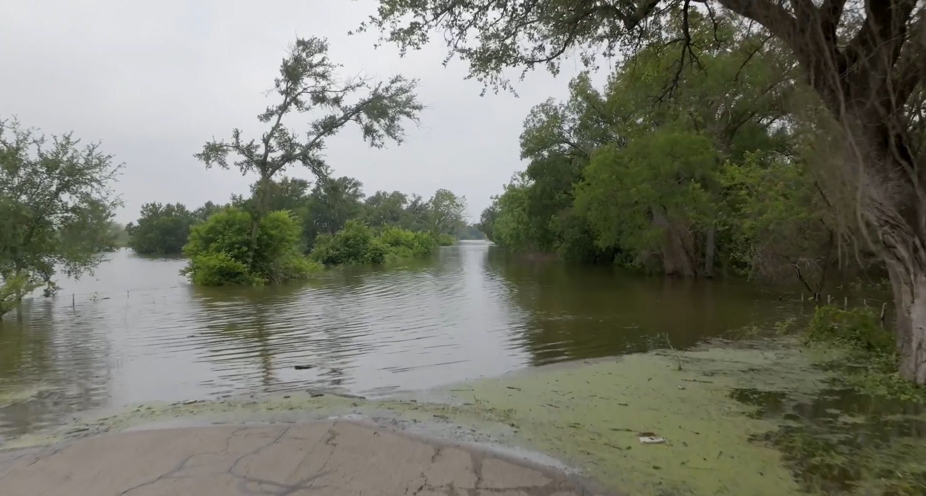 texas lake overfull after heavy rainfall, forcing dam release