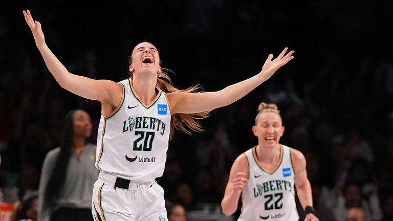 Sabrina Ionescu #20 and Courtney Vandersloot #22 of the New York Liberty react against the Seattle Storm at the Barclays Center on July 25, 2023 in the Brooklyn borough of New York City. (Photo by Mitchell Leff/Getty Images)