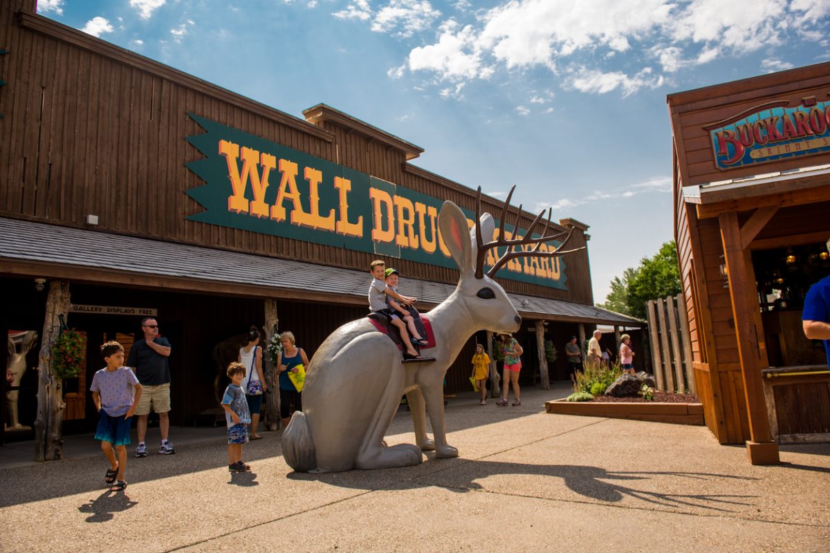 <p><a rel="noopener noreferrer external nofollow" href="https://olivechristine.com/">Travel expert</a> <strong>Olive Christine</strong> adores Wall Drug—the internationally-renowned, cowboy-themed shopping complex with an 80-foot brontosaurus sculpture.</p><p>"It's kitschy and unexpected in the best way, with a mix of shopping, dining, and various quirky attractions like a giant dinosaur and the famed free ice water," she shares. "There's a certain tongue-in-cheek humor to the entire establishment that I love."</p><p>She recommends taking time out of your road trip to explore the complex, "whether it's the Western Art Gallery or the Backyard. Have a meal at the cafe, take plenty of photos, and don't forget to get your free ice water as a souvenir of your visit."</p>