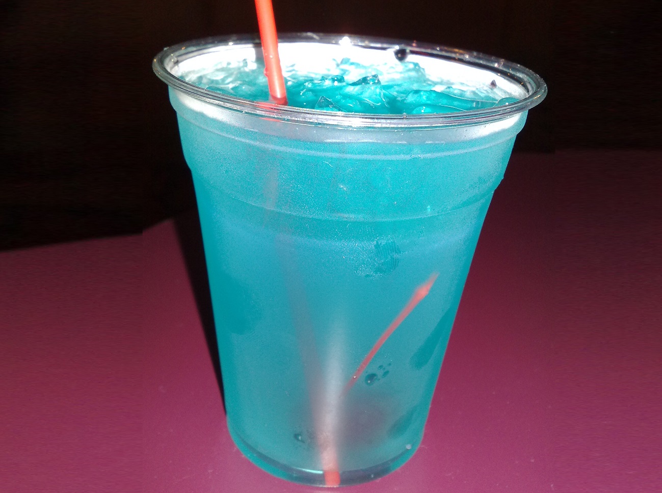 <p>The Tealasaurus looks fun and tastes amazing. With Bourbon, blue curacao, triple sec, lemon juice, and lemonade, it's sweet and zingy. The servers will also garnish it with two lemons that look like Mickey's Ears. Adorable. </p>