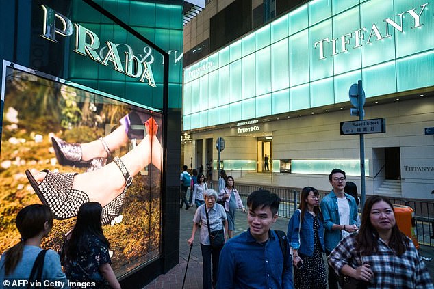 son set to take over prada empire says he's open to buying brands