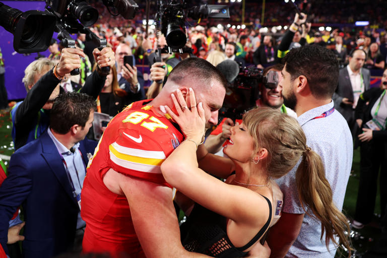 Travis Kelce #87 of the Kansas City Chiefs and Taylor Swift embrace after defeating the San Francisco 49ers 25-22 in overtime during Super Bowl LVIII at Allegiant Stadium on February 11, 2024 in Las Vegas, Nevada. Kelce recently publicly supported his girlfriend and her upcoming tour on Instagram.