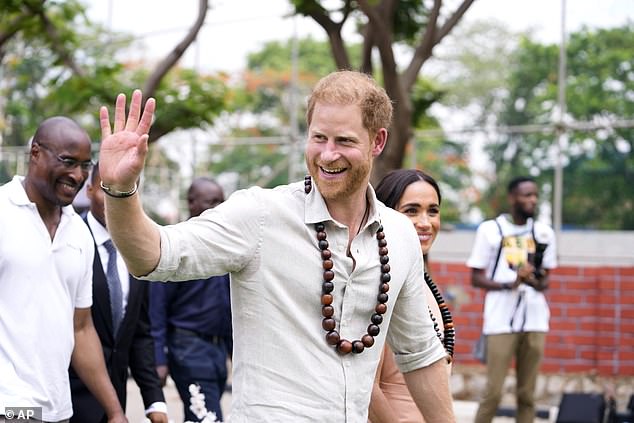 harry takes the 'lead' during nigeria trip, body language expert says