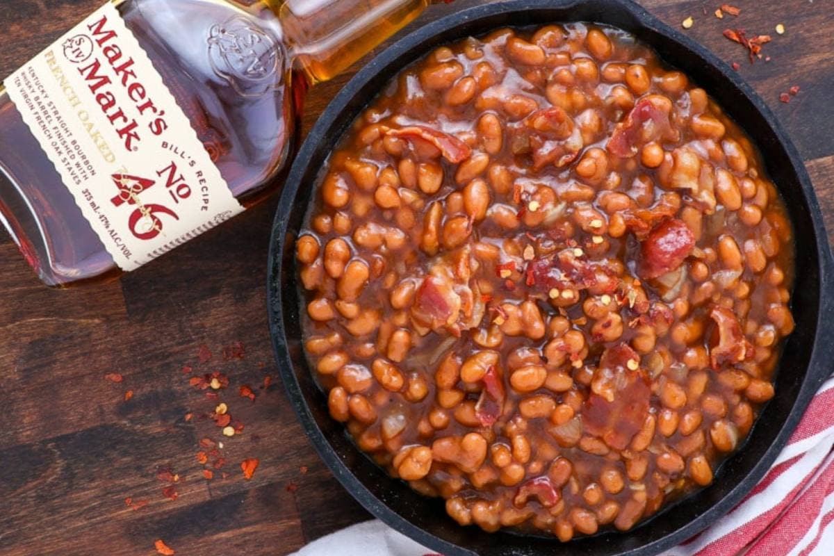 <p>Here is the perfect side dish for your next potluck, BBQ, or summer party – slow-cooked sweet and savory bourbon baked beans. This yummy recipe features a medley of flavors, including sweet barbecue sauce, crispy bacon, brown sugar, and a touch of your favorite bourbon. Best part, it’s super easy to make with minimal cleanup.</p> <p>Get The Recipe:<strong><a href="https://intentionalhospitality.com/bourbon-baked-beans-recipe/"> Bacon and Bourbon Baked Beans Recipe</a></strong></p>