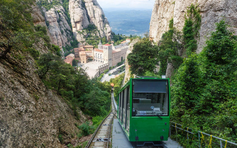 Visit the Montserrat monastery on one of the country's most scenic train trips - Alamy