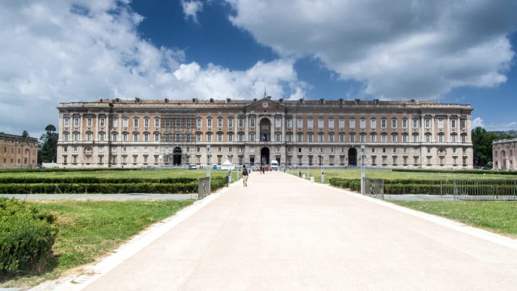 <p>The largest palace erected in Europe during the 18<sup>th</sup> century is the Royal Palace of Caserta. It was constructed on behalf of Charles VII of Naples and was designed to be the leading home for the Neapolitan king.</p><p>Like many other European palaces, this one took inspiration from the incredible Palace of Versailles, as it combined the government building, court, and king’s residence. This building is a great example of the exquisite designs and architecture loved by the Bourbons. </p><p>The building has an extensive library, over 24 state apartments, and a theatre based on the famous Teatro San Carlo in Naples. There is also a long alleyway with cascades, artificial fountains, and a botanical garden.</p>