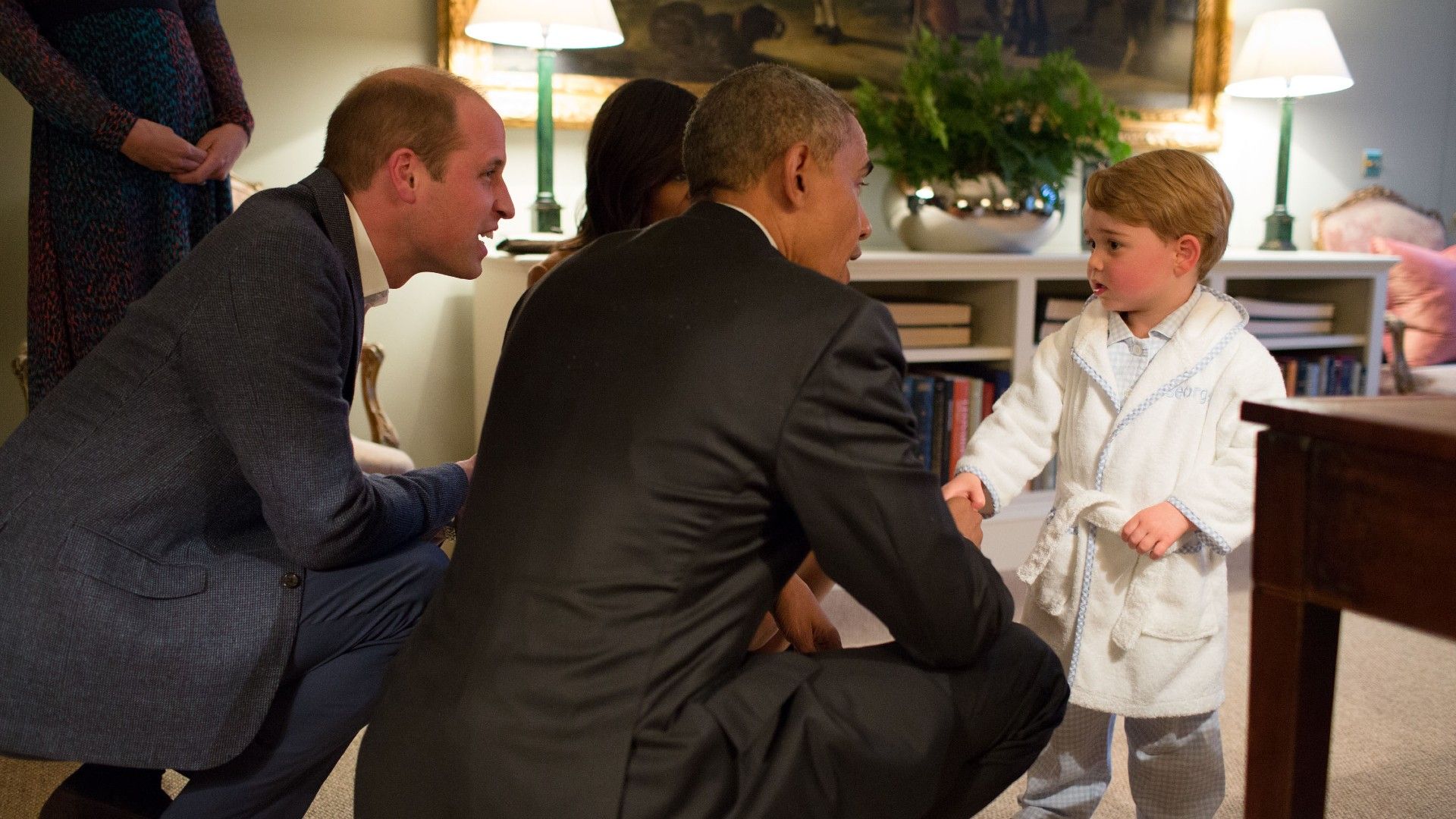 <p>                     In any circumstances, seeing Prince George in his comfy looking robe, cosy as anything in Kensington Palace would be heart-warming enough. But in 2016, George met none other than President Barack Obama while kitted out in his fleecy robe.                   </p>                                      <p>                     The adorable encounter saw President Obama crouch down to greet the Prince, who surely must have stayed up past his bedtime.                   </p>                                      <p>                     For his late night efforts, he was reportedly gifted a wooden rocking horse by the President and First Lady Michelle.                   </p>